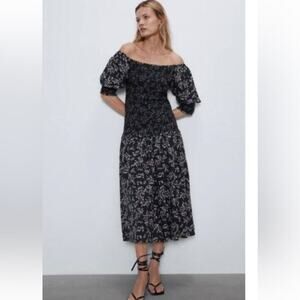 Zara floral off shoulder dress with ruched slimming tummy area. size small